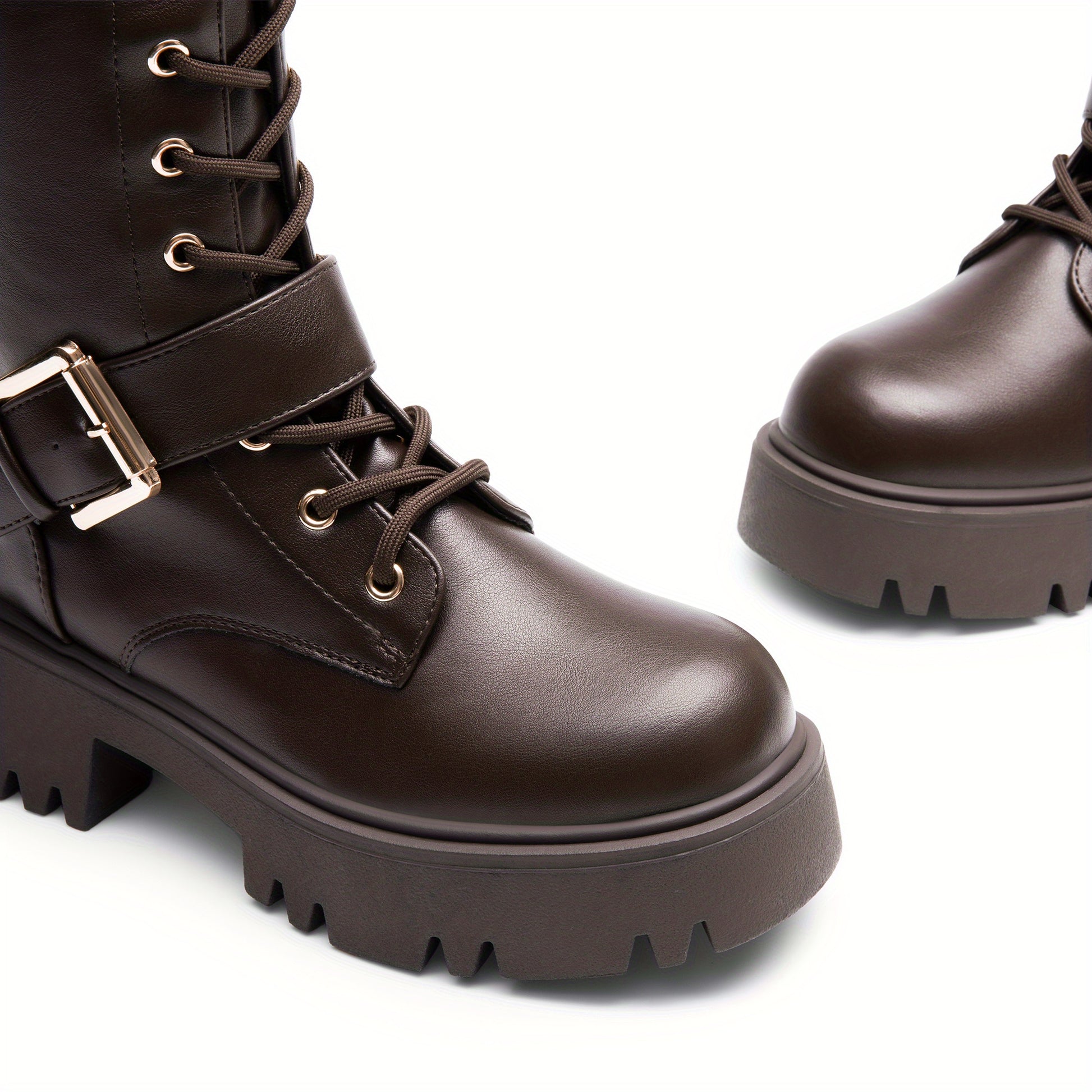 Alternative darkwave knee high boots women buckle strap side zipper and chunky lug sole close up detail
