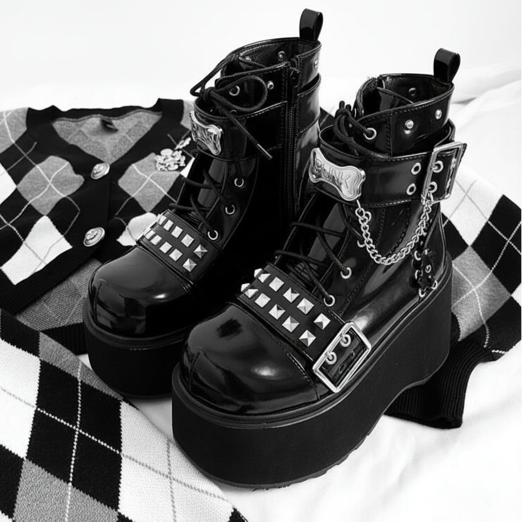 Black_studded_platform_ankle_boots_alternative_darkwear_women_buckle_chain_detail_front_view