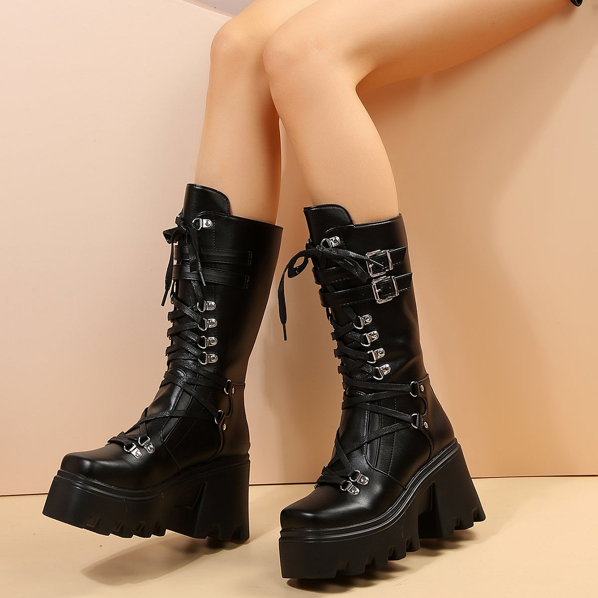 Matte black alternative darkwave knee high platform boots women bat buckle strap lace up front full view
